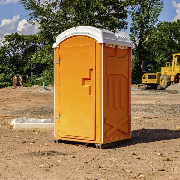 what is the cost difference between standard and deluxe portable restroom rentals in Dunn County